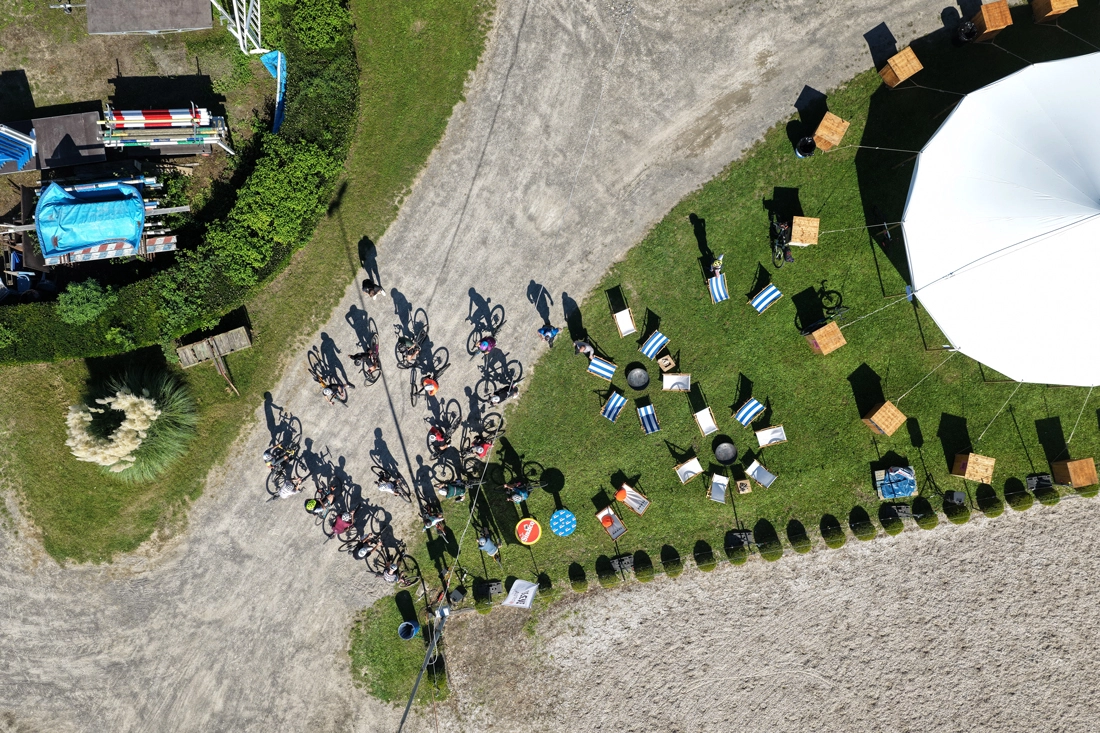 Riders and crowd gathered at the Graveldrome venue